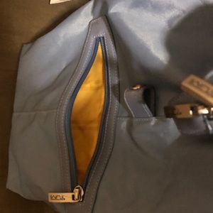 Tumi carry on duffel bag and carry all